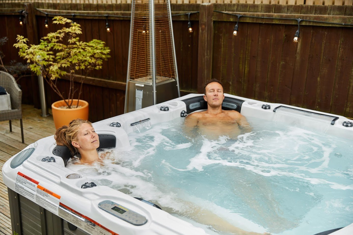 Two people relaxing in a hot tub