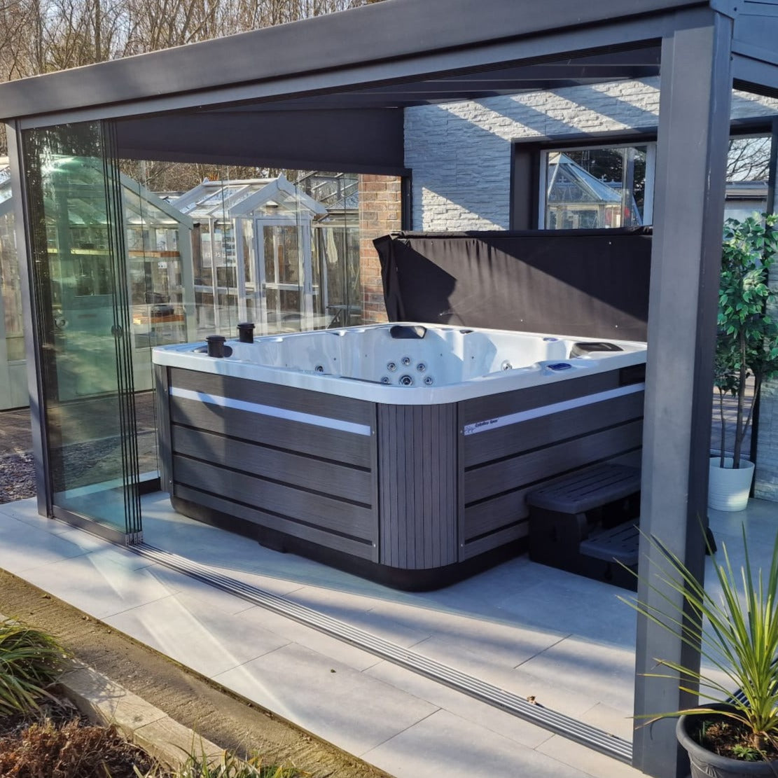 CX-6 Hot tub installed in glass garden room